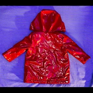 This Baby Gap Red Raincoat is perfect for playing in the rain.